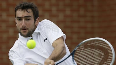 Marin Cilic has had the ban back-dated to May 1 this year, meaning he will be able to return to action on February 1, 2014. Alastair Grant / AP Photo