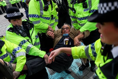 Police arrest a Palestine Action protester in Liverpool. Reuters