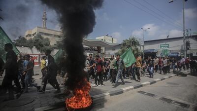 Palestinians attend the funeral of Mohammed Jamal Abu Halima, 22, who was shot dead by Israeli military during a protest along the border of the Gaza Strip. EPA/HAITHAM IMAD