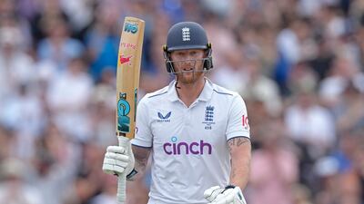 England's Ben Stokes celebrates reaching his half-century. Reuters
