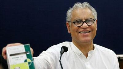 Anand Grover, a lawyer for the Cancer Patients Aid Association, shows a package of a generic version of the cancer drug Glivec after India's Supreme rejected Novartis' bid to patent Glivec on Monday. Manish Swarup / AP Photo