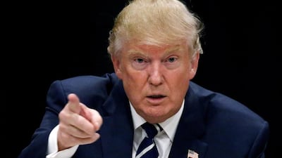 If US president-elect Donald Trump disrupts world trade with increased tariffs, all bets are off on global oil demand. Carlo Allegri / Reuters