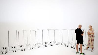 A model is interviewed backstage before a presentation of God Save Queens Spring/Summer 2017 collection during New York Fashion Week in Manhattan. Lucas Jackson / Reuters