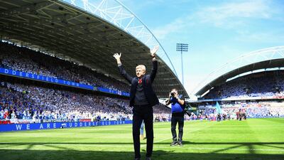 Arsenal manager Arsene Wenger acknowledges the Arsenal fans before his last Premier League match in charge, at Huddersfield Town's John Smith's Stadium on May 13, 2018. Getty