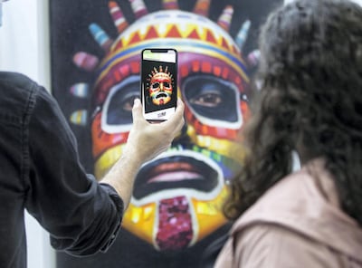 Artist Coco Valdez's paintings come alive in his augmented reality app. Leslie Pableo / The National