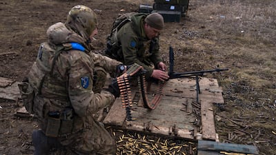 Ukrainian servicemen take part in military training at an undisclosed location near the frontline. EPA