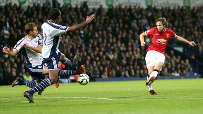Manchester United's Daley Blind shoots and scores the equaliser in United's 2-2 draw with West Brom on Monday night in the Premier League in Birmingham. Kieran Galvin / EPA