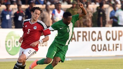Nigeria’s forward Ahmed Musa (R) vies with Egypt’s defender Ibrahim Salah during the African Cup of Nations qualification match between Egypt and Nigeria, on March 25, 2016, in Kaduna. AFP / PIUS UTOMI EKPEI