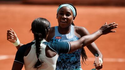 USA's Coco Gauff, right, hugs Sloane Stephens after her win in the quarter-final of the French Open. AP