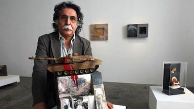 The Iraqi artist and curator Dia al Azzawi at the Art Sawa gallery in Dubai.