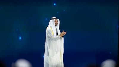 President Sheikh Mohamed applauds during the opening ceremony at Abu Dhabi National Exhibition Centre