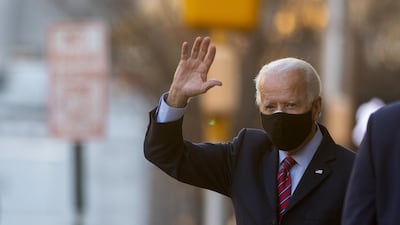 President-elect Joe Biden waves as he departs the Queen Theatre after meeting virtually with the United States Conference of Mayors in Wilmington, Delaware. AFP
