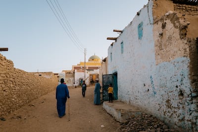 An impromptu evening walk through a fishermen's village out to the edge of the Sahara. Erin Clare Brown / The National