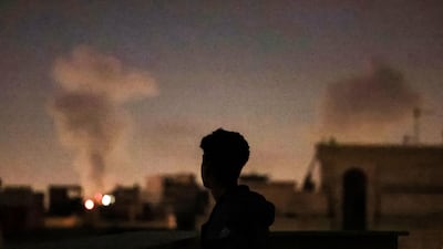 A plume of smoke rises after a strike on Tehran on March 4, 2026. The United States and Israel launched strikes against Iran on February 28, with the killing of Iran's supreme leader and the Islamic republic retaliated with barrages of missiles at Gulf states and Israel. (Photo by ATTA KENARE / AFP)