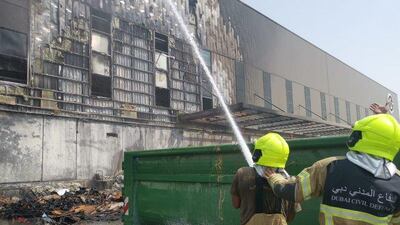 Firefighters dousing the blaze at a Dubai Duty Free warehouse. Courtesy: Dubai Civil Defence