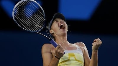 Maria Sharapova celebrates after defeating Venus Williams in their third round match at the Australian Open.