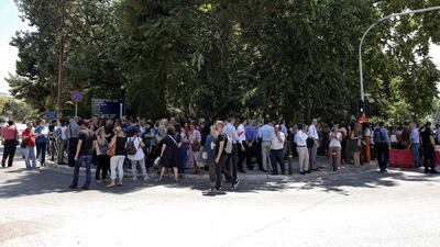 epa07726827 Citizens gather in an open area following an earthquake, in central Athens, Greece, 19 July 2019.An earthquake measuring 5.1 on the Richter scale shook Athens at 14:13 on 19 July 2019. The epicentre of the quake, according to Aristotle University of Thessaloniki professor of seismology Costas Papazachos was located in the Parnitha mountain range, above the Attica towns of Mandra and Magoula. EPA/SIMELA PANTZARTZI
