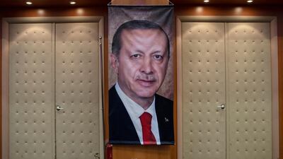 A picture of Turkish President Recep Tayyip Erdogan at a press conference for the Justice and Development Party. Sedat Suna / EPA