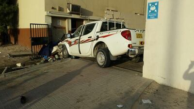 One person was killed and three injured when a pick-up truck swerved into a minibus then rammed into the entrance of a company in Al Quoz, Dubai.