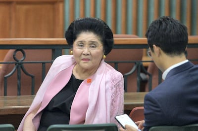 Marcos is now trying to bring her son Bongbong to power. AFP.