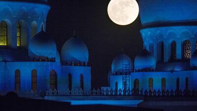 The full super moon rises over the Sheikh Zayed Grand Mosque in Abu Dhabi on November 14, 2016. The moon is the closest its been to Earth since 1948. Christopher Pike / The National