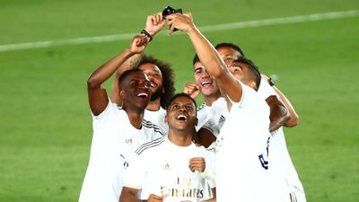 Real Madrid's Rodrygo,Vinicius and teammates celebrate after winning La Liga title. Reuters