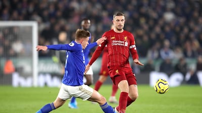 Jordan Henderson of Liverpool is tackled by Harvey Barnes of Leicester City on Thursday. Getty Images