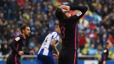 Gerard Pique of Barcelona reacts after missing a goal opportunity. Octavio Passos / Getty Images