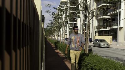 Reporter Naser Al Wasmi walks to work from his home in an attempt to reduce his carbon footprint. Christopher Pike / The National
