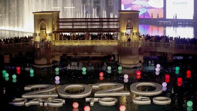 Celebrations underway at the Dubai Mall Fountain where members of the public could register and write their wish on an LED ball which was then set afloat in the fountain. Antonie Robertson/ The National