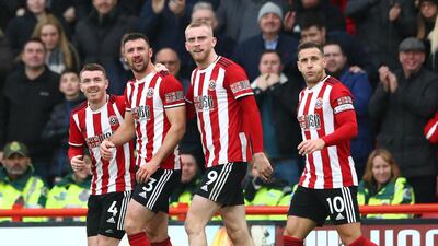 Enda Stevens, second left, celebrates after scoring for Sheffield United against Brighton. Getty