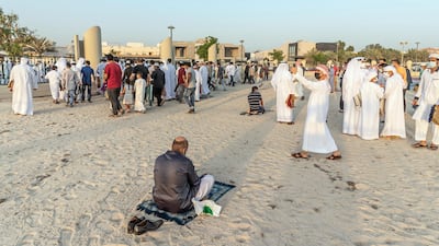 UAE's National Emergency Crisis and Disaster Management Authority outlined Covid-19 safety precautions for Eid Al Fitr, such as limiting prayer times to 15 minutes and avoiding family visits and gatherings. Antonie Robertson / The National