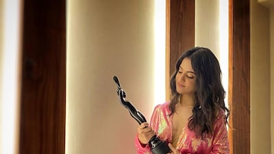 Music composer Jasleen Royal with her Best Music Album award for 'Shershaah'. Photo: Instagram / jasleenroyal