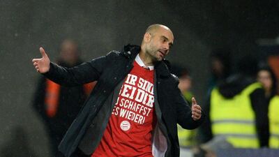 Bayern Munich manager Pep Guardiola shown during his team's Bundesliga match against Augsburg last weekend. Andreas Gebert / EPA / February 14, 2016