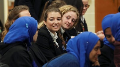 Students from the MDQ Academy Islamic School and Saint Anthony’s High School speak during a field trip at the Roman Catholic school in Huntington, New York, on April 26, 2017. Shannon Stapleton / Reuters