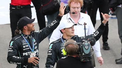 Lewis Hamilton and George Russell wave to the crowd after the sprint race. EPA
