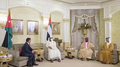 Sheikh Mohammed bin Zayed, Crown Prince of Abu Dhabi Deputy Supreme Commander of the Armed Forces, meets with King Abdullah, at the Presidential Airport. Seen with Sheikh Tahnoon bin Zayed, National Security Advisor, and Sheikh Mansour bin Zayed, Deputy Prime Minister and Minister of Presidential Affairs. Ryan Carter / Crown Prince Court - Abu Dhabi