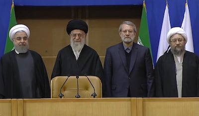 Ali Larijani, second right, with his former boss and supreme leader Ayatollah Ali Khamenei, second left, in 2017. AFP