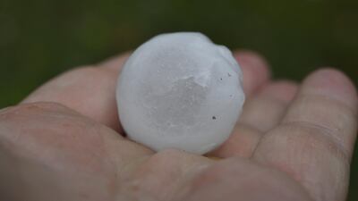 A large piece of hail is seen during a storm in Sydney, Australia, on December 20, 2018. AAP / Brendan Esposito / via Reuters