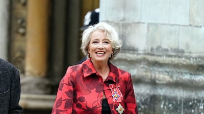 Dame Emma Thompson in a floral coat. PA