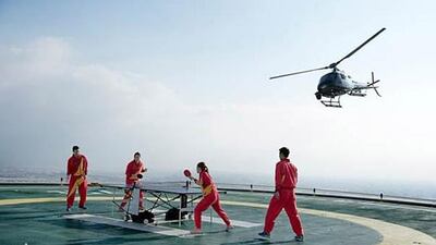 Chinese players Long Ma and Liu Shiwen play Zhang Jike and Li Xiaoxia on the Burj Al Arab helipad. They are members of the Chinese national table tennis team that Dubai has sponsored since January last year. Courtesy Jumeirah Group