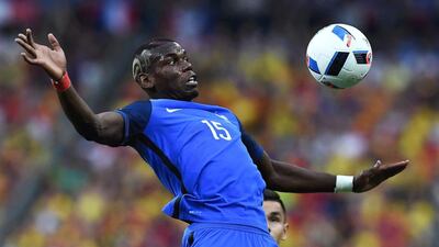 France's midfielder Paul Pogba plays the ball during the Euro 2016 group against Romania at Stade de France. Franck Fife / AFP