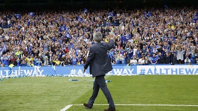 Chelsea manager Jose Mourinho waves to fans following the Premier League trophy presentation on Sunday after their last match of the season. Adrian Dennis / AFP / May 24, 2015