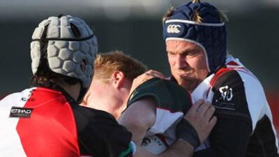 UAE rugby officials are concerned over the current state of the Dubai Exiles, right, who are having trouble fielding a starting XI and have had to withdraw from competition.