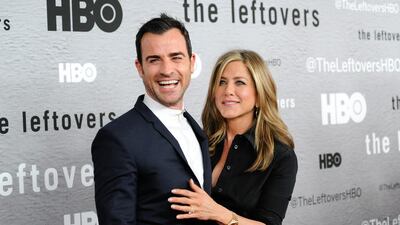 Actors Jennifer Aniston, right, and Justin Theroux attend HBO’s The Leftovers season premiere at the NYU Skirball Center on Monday, June 23, 2014. AP