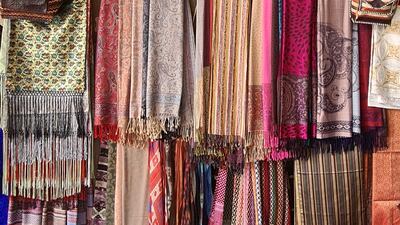 Brocade is a silk cloth embroidered with silver or gold threads.