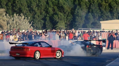 Dubai, May 31, 2013 - Stunt drivers demonstrate drifting techniques for crowds at the Fast and Furious "Extreme Car Park" event at Studio City in Dubai, May 31, 2013. (Photo by: Sarah Dea/The National)