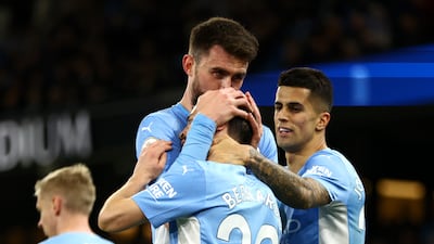 Bernardo Silva, centre, has signed a new deal at Manchester City but Aymeric Laporte, left, is leaving the club. Getty