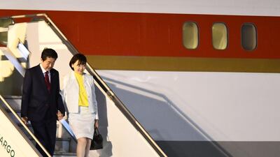 Prime Minister of Japan Shinzo Abe and his wife Akie arrive at Ministro Pistarini International Airport. Getty Images