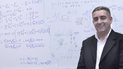 Dr Issam Qattan, an assistant professiror of physics at Khalifa University, is researching how semiconductors perform through careful analysis and mathematical calculations of the materials used in manufacture. Jeffrey E Biteng / The National